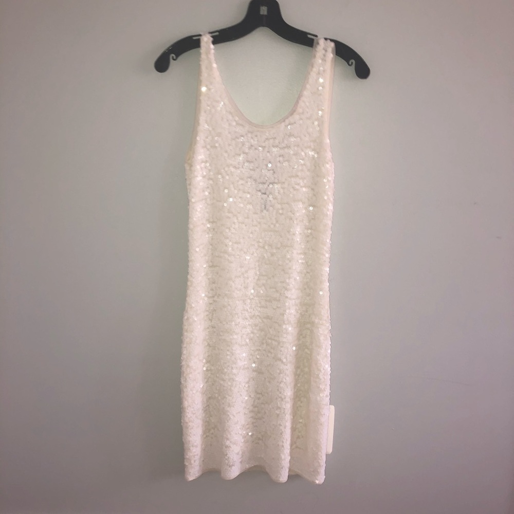 A white mini glittery dress